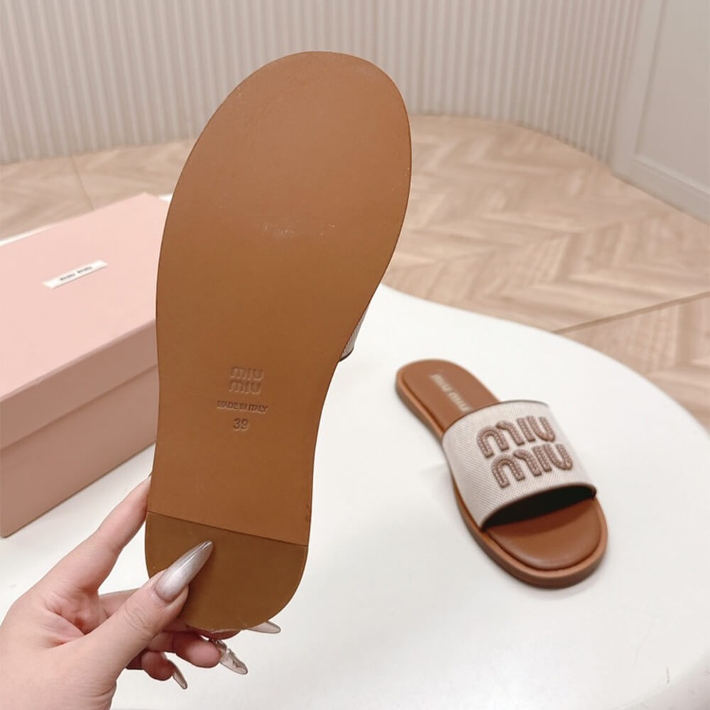 MiuMiu Canvas and leather slides